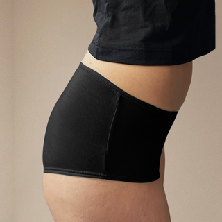 Side view woman wearing Organic Cotton Hipster in black – sits below waist, lightweight feel with soft, form-flattering seams