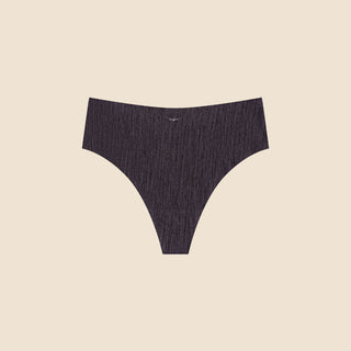 Netherlin's black seamless high rise thong, made of aerated, quick-drying fabric and embedded with mineral fibers to inhibit odor and bacteria.