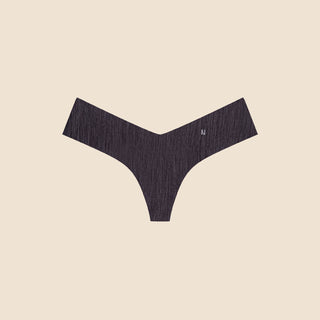 Netherlin's black seamless mid rise thong, made of aerated, quick-drying fabric and embedded with mineral fibers to inhibit odor and bacteria.